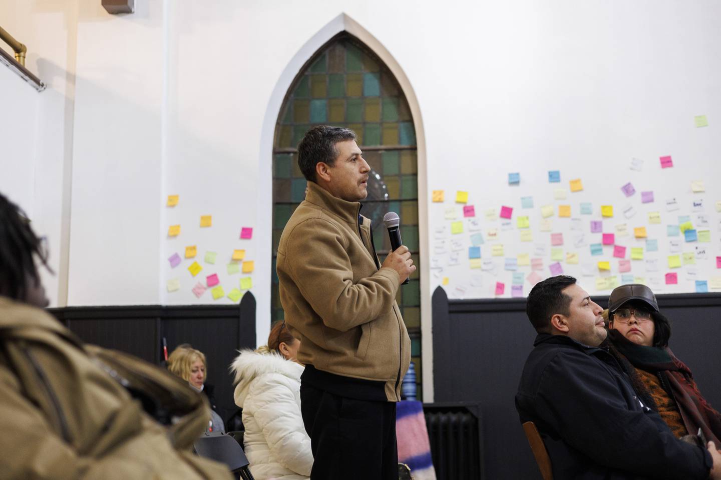Juan Carlos Padilla, a parent of a Benito Juarez High School student, speaks at the Lincoln United Methodist Church during a community meeting in response to a fatal shooting at the school on Friday.