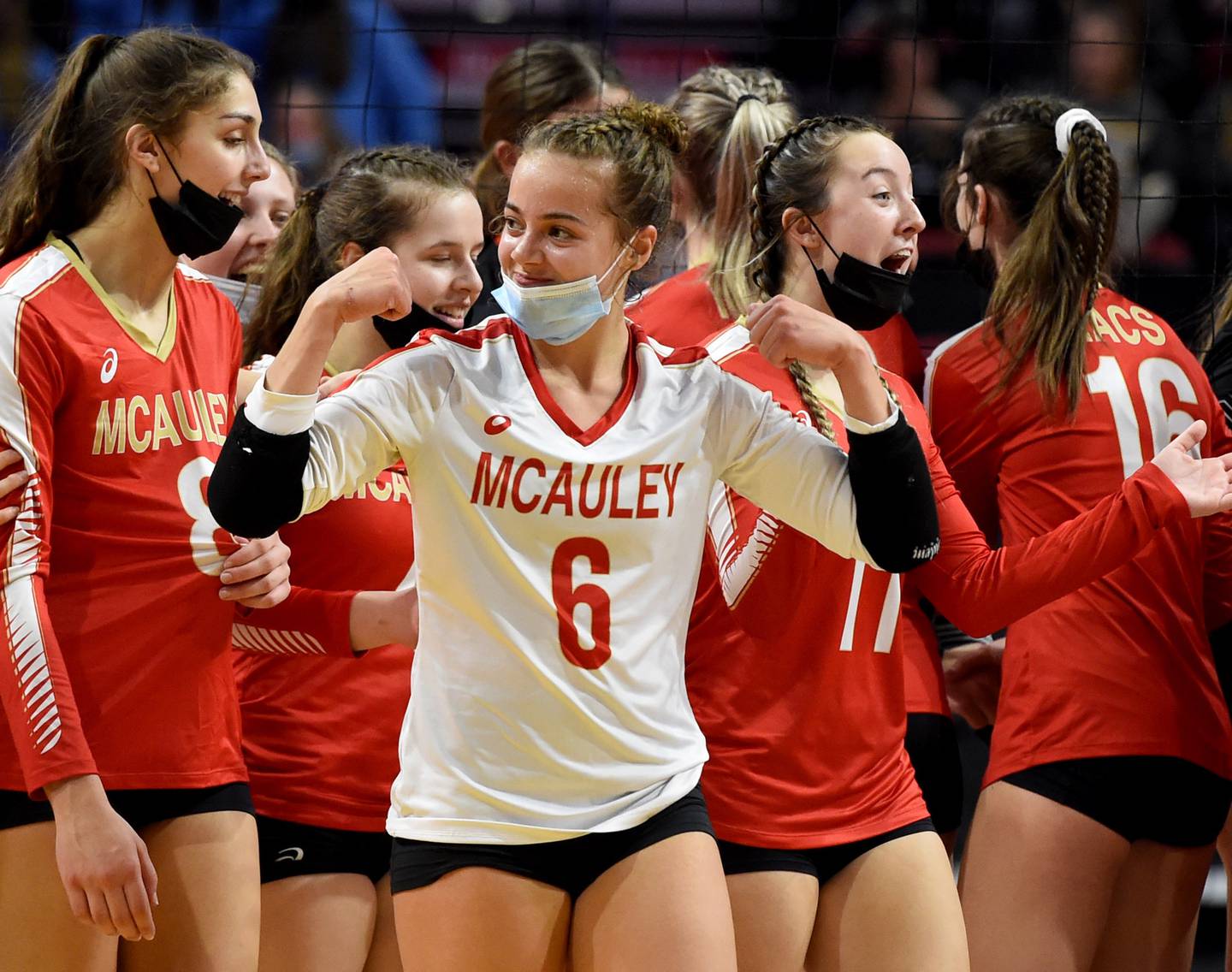 Mother McAuley’s Gigi Navarrete (6) has some fun with the fans after a victory over Edwardsville in the Class 4A state semifinals on Friday Nov. 12, 2021.