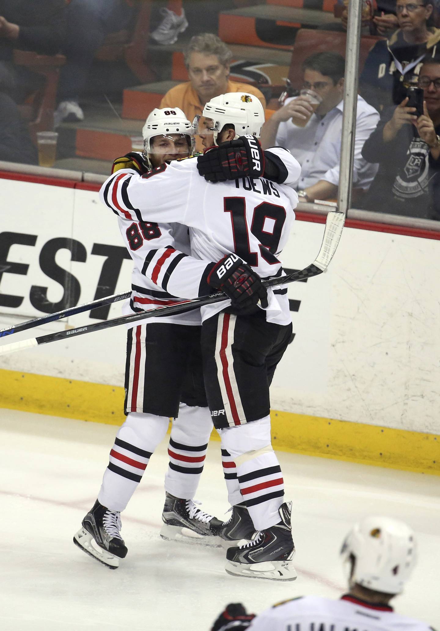 Blackhawks right wing Patrick Kane (88) and Jonathan Toews celebrate Toews' first goal in the first period of Game 7 of the Western Conference Finals against the Ducks on May 30, 2015, at the Honda Center in Anaheim, Calif. 
