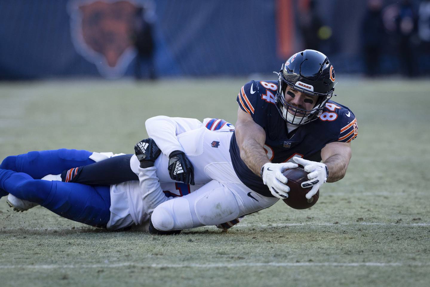 Bears tight end Ryan Griffin (84) reaches out trying to convert a fourth down, but the play was overturned at Soldier Field on Dec. 24, 2022.