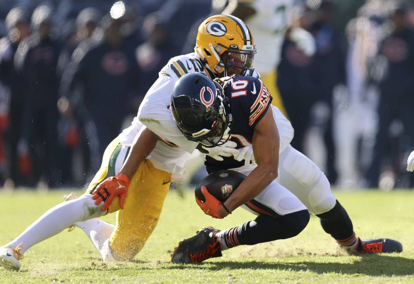 Bears wide receiver Chase Claypool (10) suffers a right knee injury as he fumbles the ball in the second quarter against the Packers on Dec. 4 at Soldier Field. 