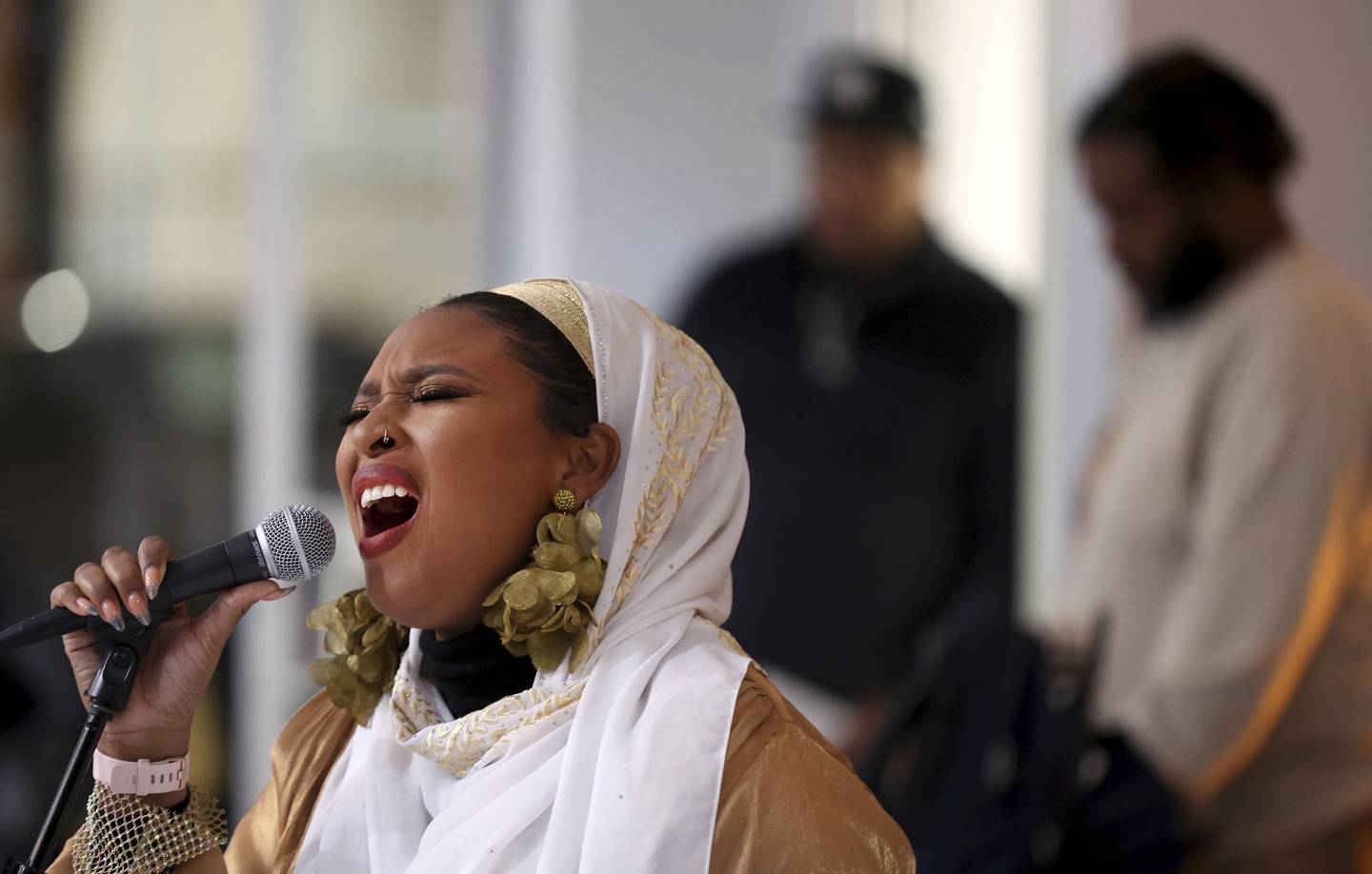 Musician Maimouna Youssef, aka Mumu Fresh, performs at the 25th anniversary celebration for the Inner-City Muslim Action Network on Dec. 1, 2022, in the Chicago Lawn neighborhood of Chicago.