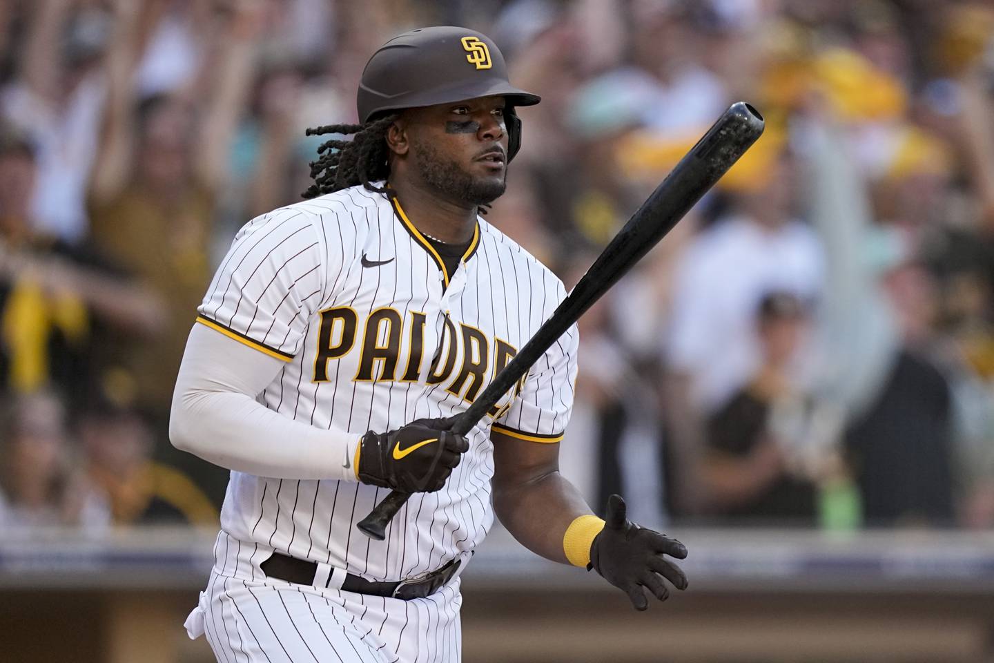 The Padres' Josh Bell watches his RBI single during the fifth inning against the Phillies on Oct. 19, 2022.