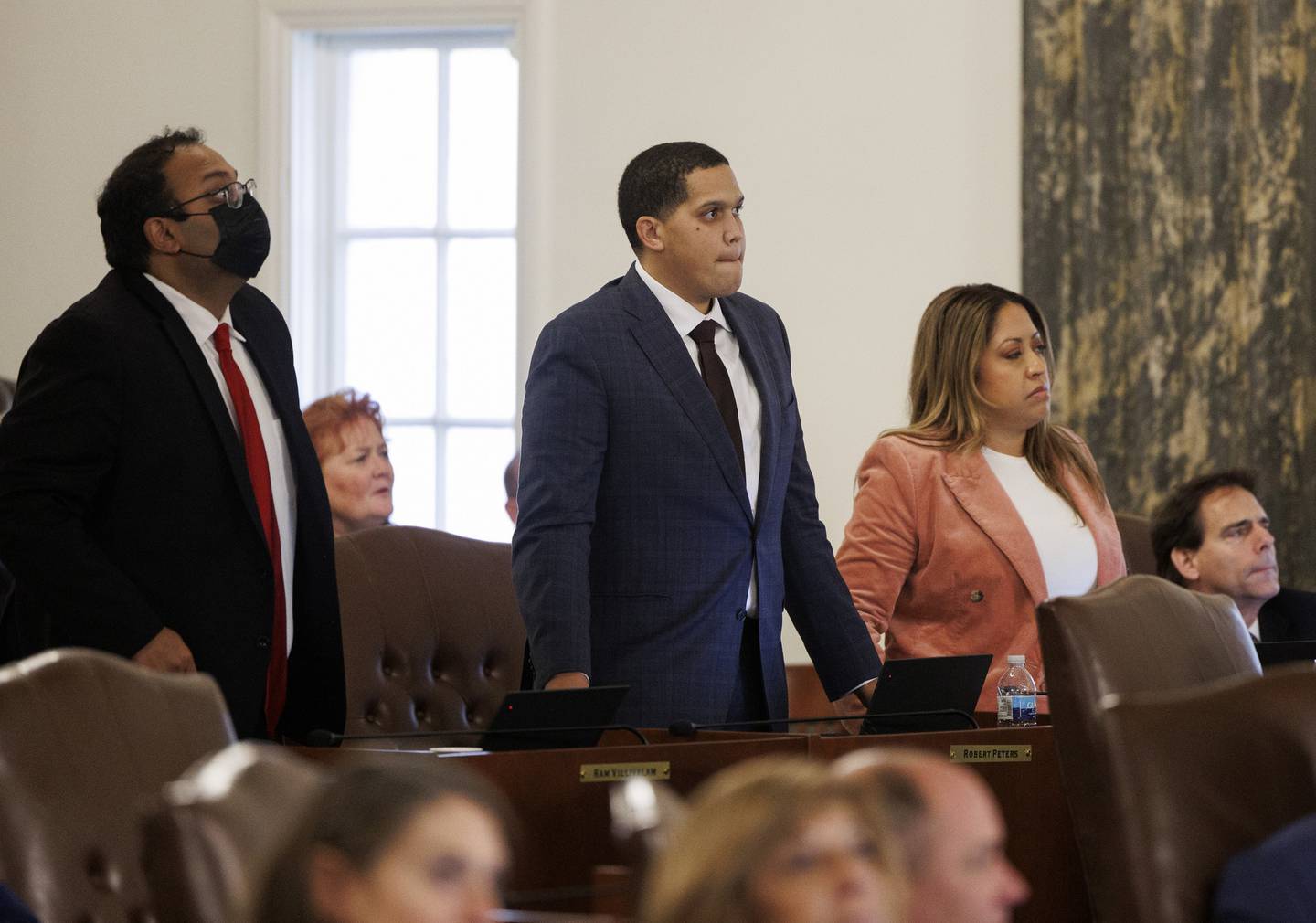 State Sen. Robert Peters, center, watches as votes are tallied shortly before the Senate approved changes to the controversial criminal justice law known as the SAFE-T Act at the Illinois Capitol building on Dec. 1, 2022, in Springfield. 