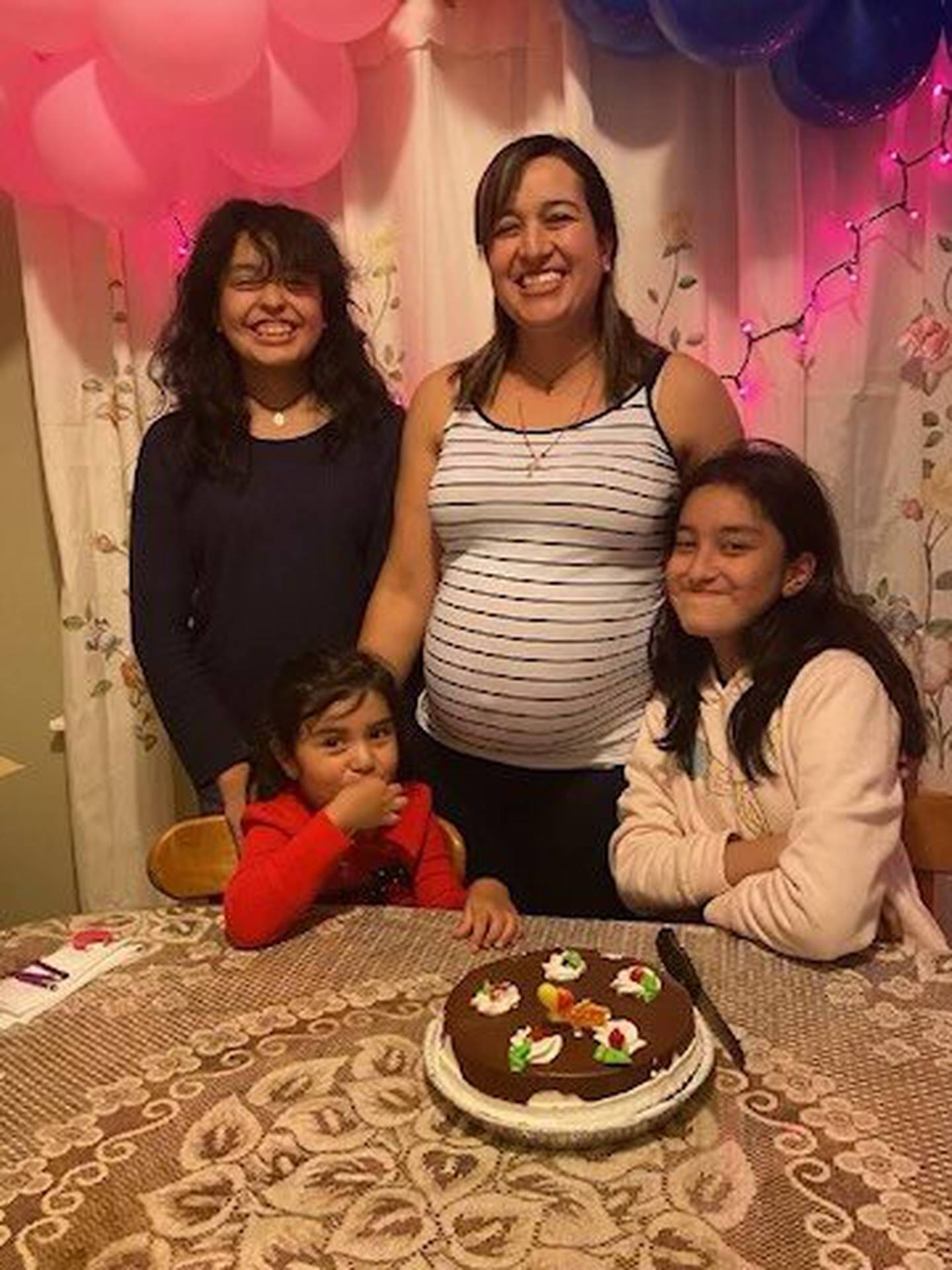In an undated photo, Lupe Avila is with her daughters Isabel, 13, Angela, 11, and Lupita, 3. Their Cicero apartment burned down on Christmas Day.