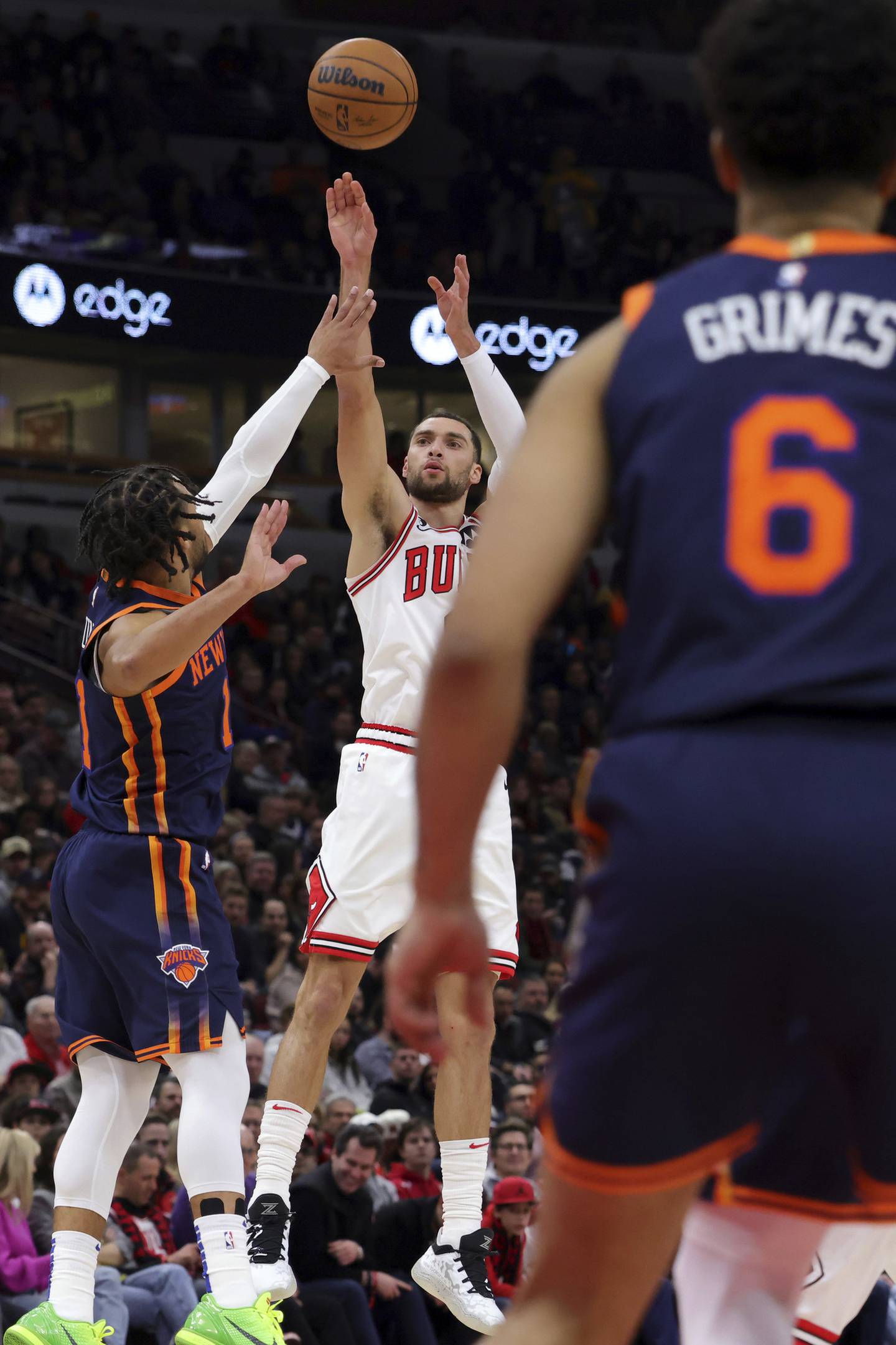 Bulls guard Zach LaVine shoots over Knicks guard Jalen Brunson in the first half Dec. 16, 2022, at the United Center.