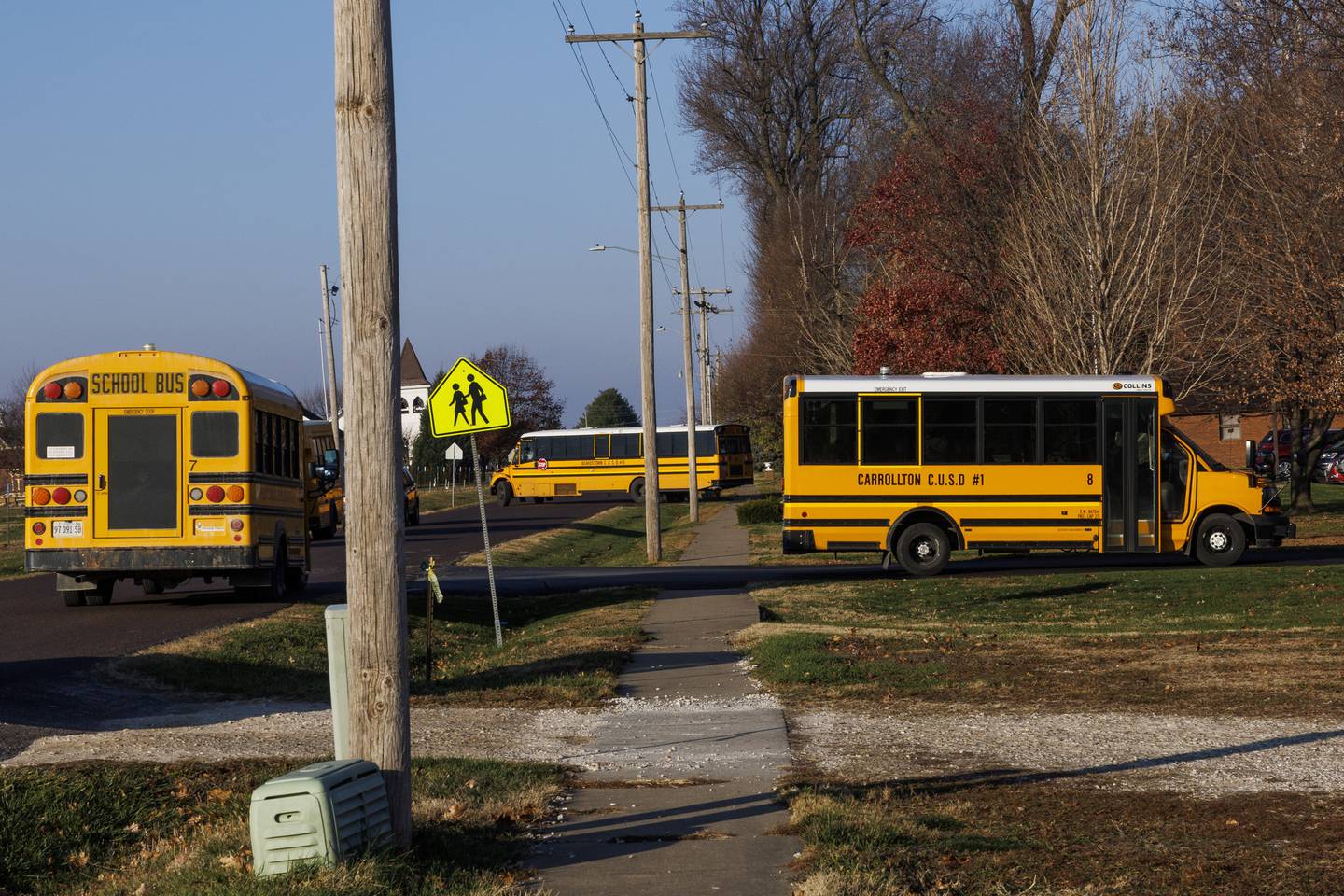 Buses from school districts throughout an eight-county region of rural Illinois bring students to the Garrison School on a morning in November. 