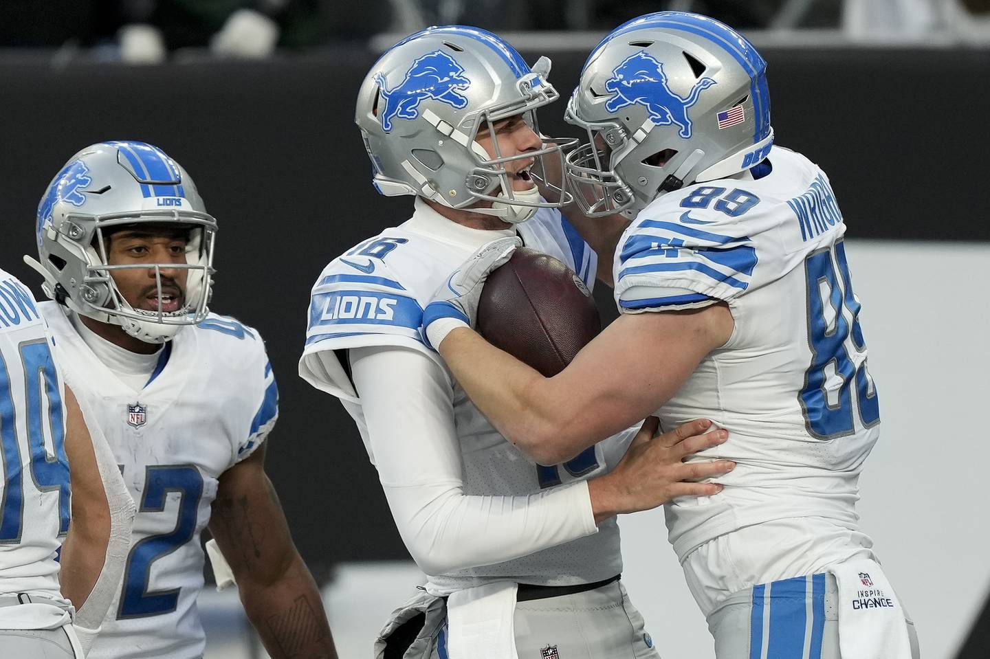 Brock Wright celebrates with quarterback Jared Goff (16) after a touchdown in the Lions' victory against the Jets on Dec. 18 in East Rutherford, N.J. 
