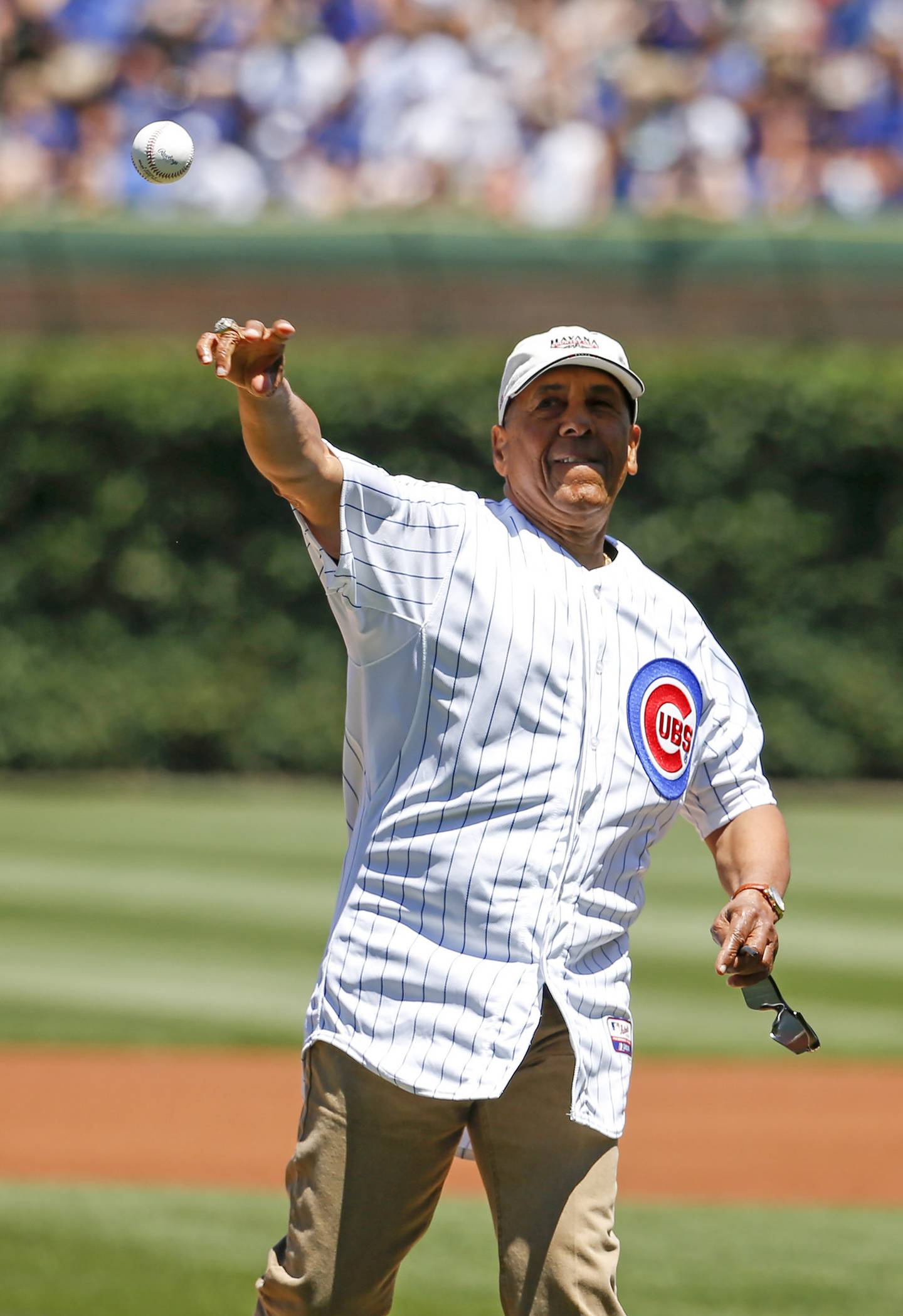 Former Cubs outfielder José Cardenal throws out a ceremonial pitch before a game against the Pirates on June 17, 2016, at Wrigley Field.