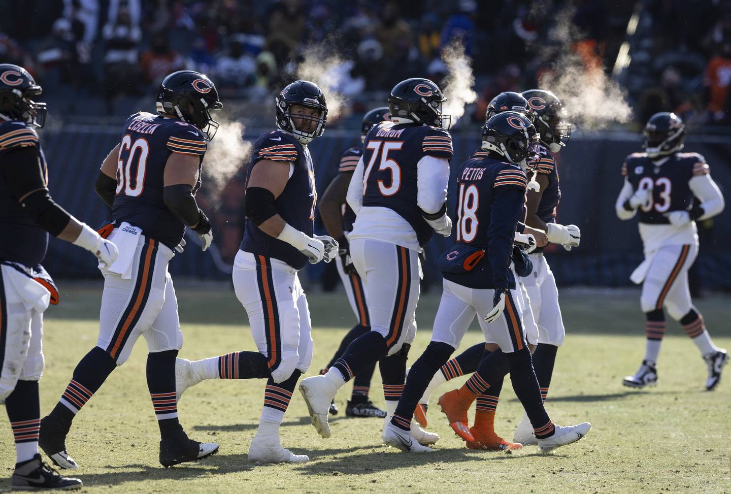 The Bears leaves the field in the first quarter of the 35-13 loss to the Bills at Soldier Field on Dec. 24, 2022.