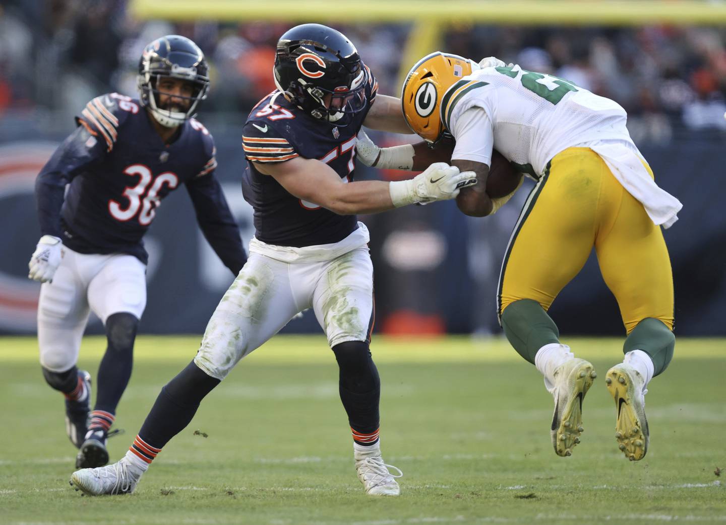 Bears linebacker Jack Sanborn tackles Packers running back AJ Dillon in the fourth quarter at Soldier Field on Dec. 4, 2022.