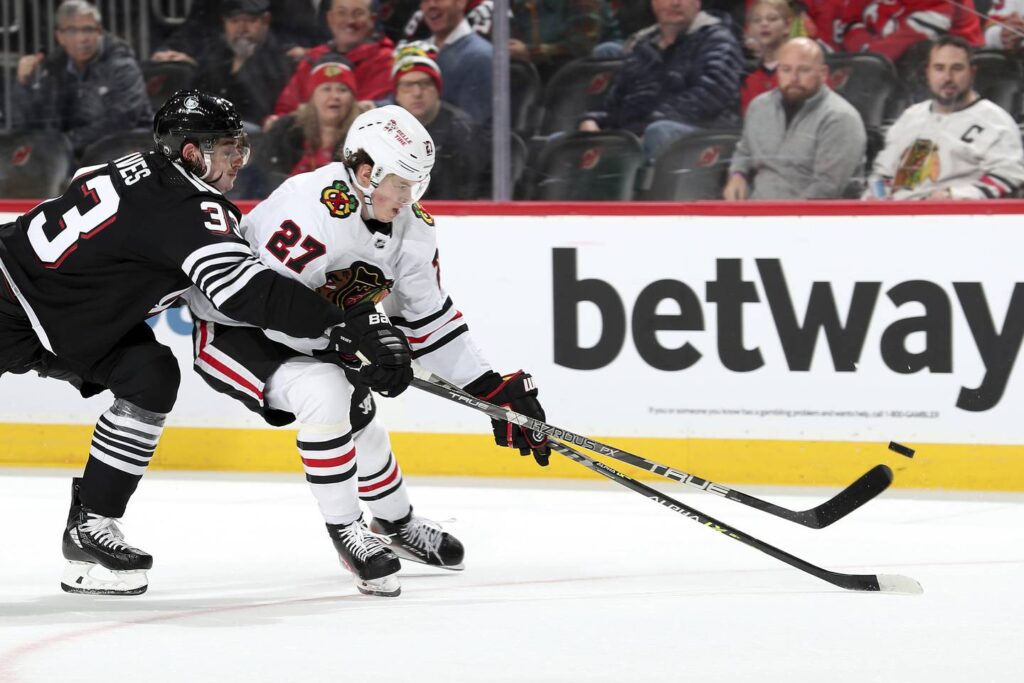 Lukas Reichel made his season debut — but how long will he stay? 4 takeaways from the Chicago Blackhawks’ 3-0 loss to the New Jersey Devils.