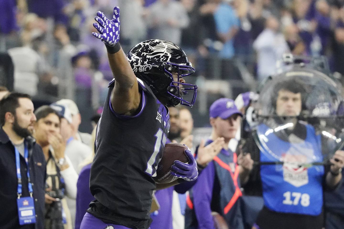 TCU wide receiver Quentin Johnston celebrates a catch for a first down in the second half of the Big 12 championship game against Kansas State on Dec. 3, 2022, in Arlington, Texas.