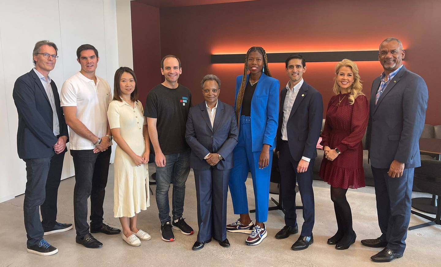 Mayor Lori Lightfoot and other officials join then-FTX.US president Brett Harrison, fourth from left, at the grand opening of the exchange's Chicago headquarters on May 10, 2022.