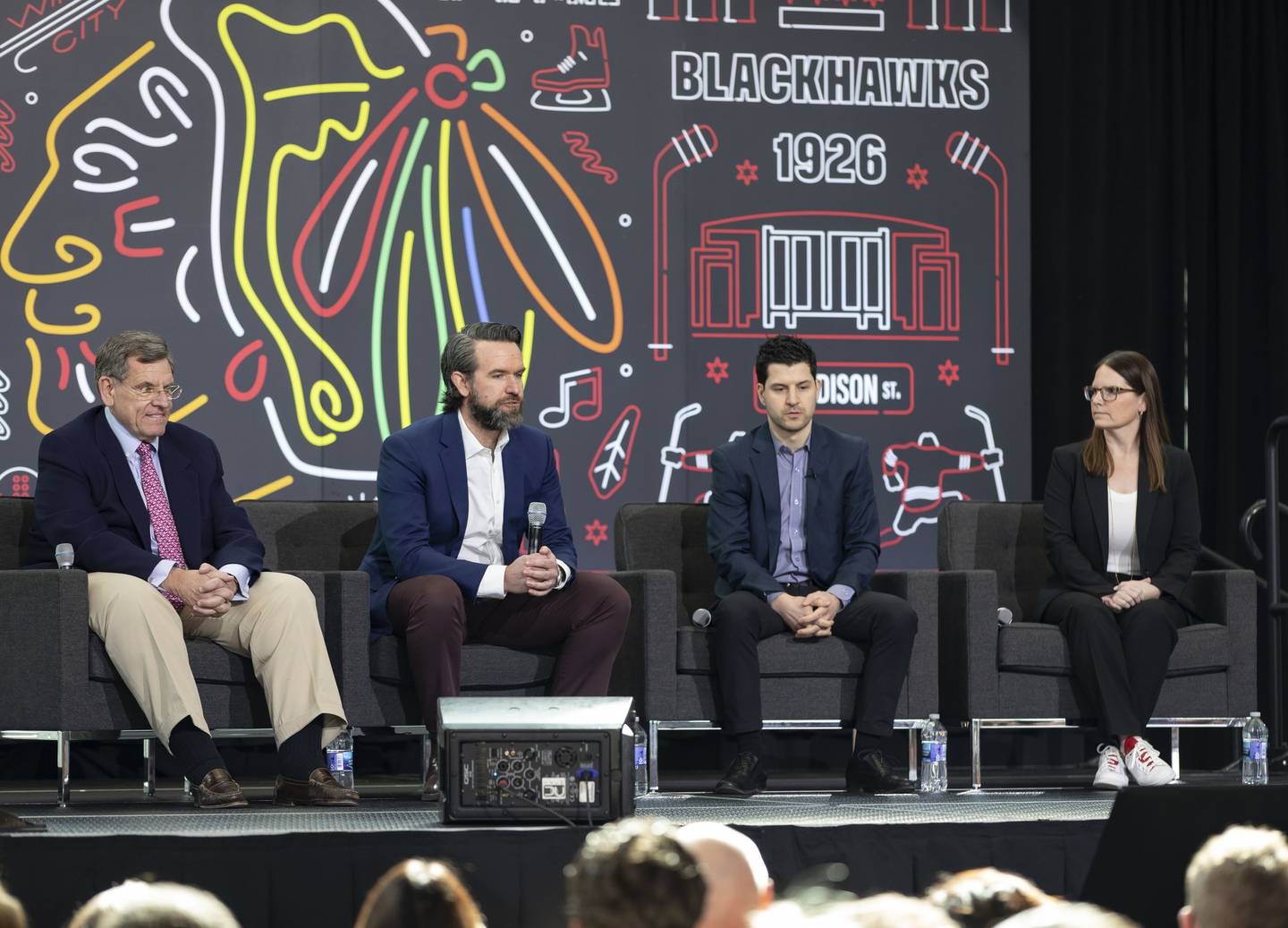 Blackhawks chairman Rocky Wirtz and CEO Danny Wirtz introduce Kyle Davidson as their new general manager with Jaime Faulkner, president of business operations, on March 1, 2022, at the United Center.
