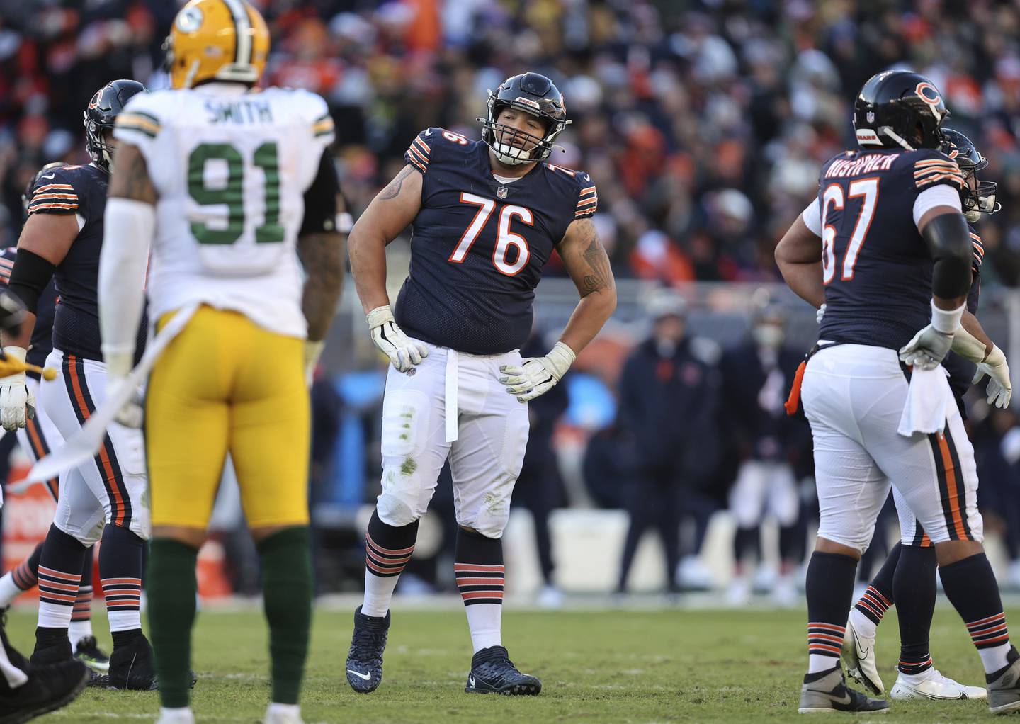 Bears offensive tackle Teven Jenkins reacts after committing a penalty in the third quarter against the Packers at Soldier Field on Dec. 4, 2022.