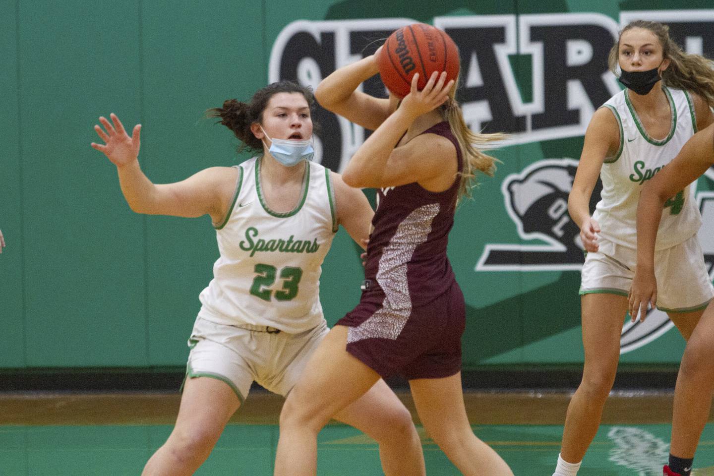 Oak Lawn's Mia Kennelly (23) clamps down on defense against Lockport's Angelica Bafia during a nonconference game on Saturday Dec. 18, 2021.