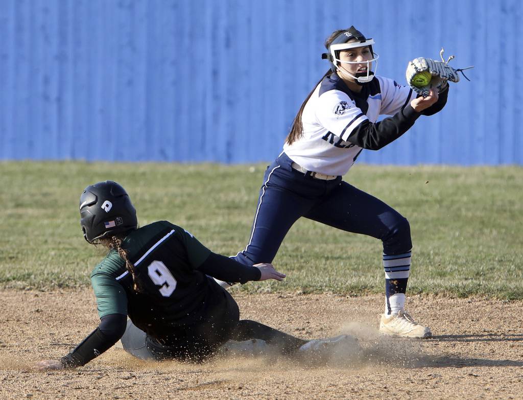 Reavis' Sienna Aragones makes the play at second base against Evergreen Park's Charley Burns during a South Suburban Red game in Burbank on Tuesday, March 28, 2023.