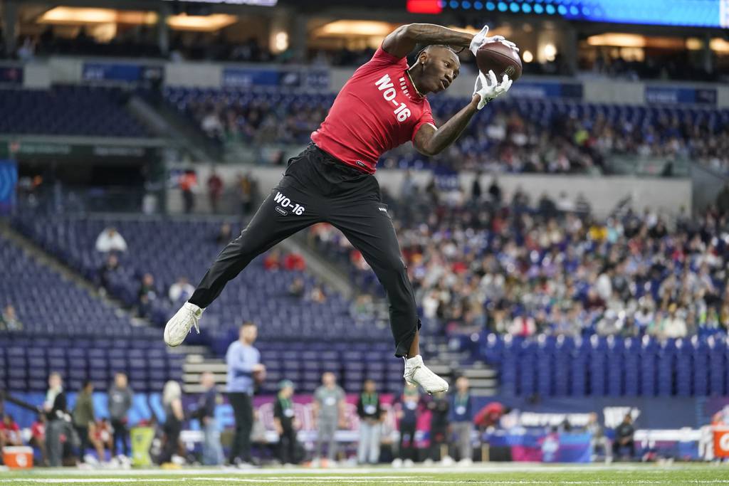 Boston College wide receiver Zay Flowers runs a drill at the NFL combine on March 4, 2023.
