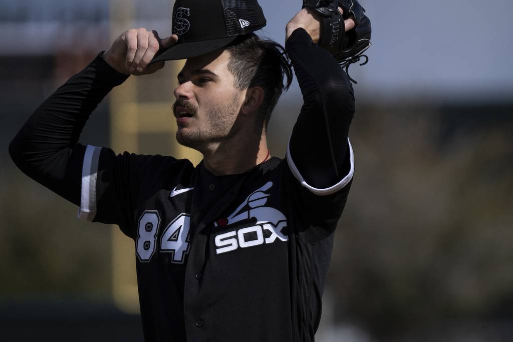 White Sox pitcher Dylan Cease throws during a pregame workout at Camelback Ranch on Feb. 26, 2023, in Glendale, Ariz.