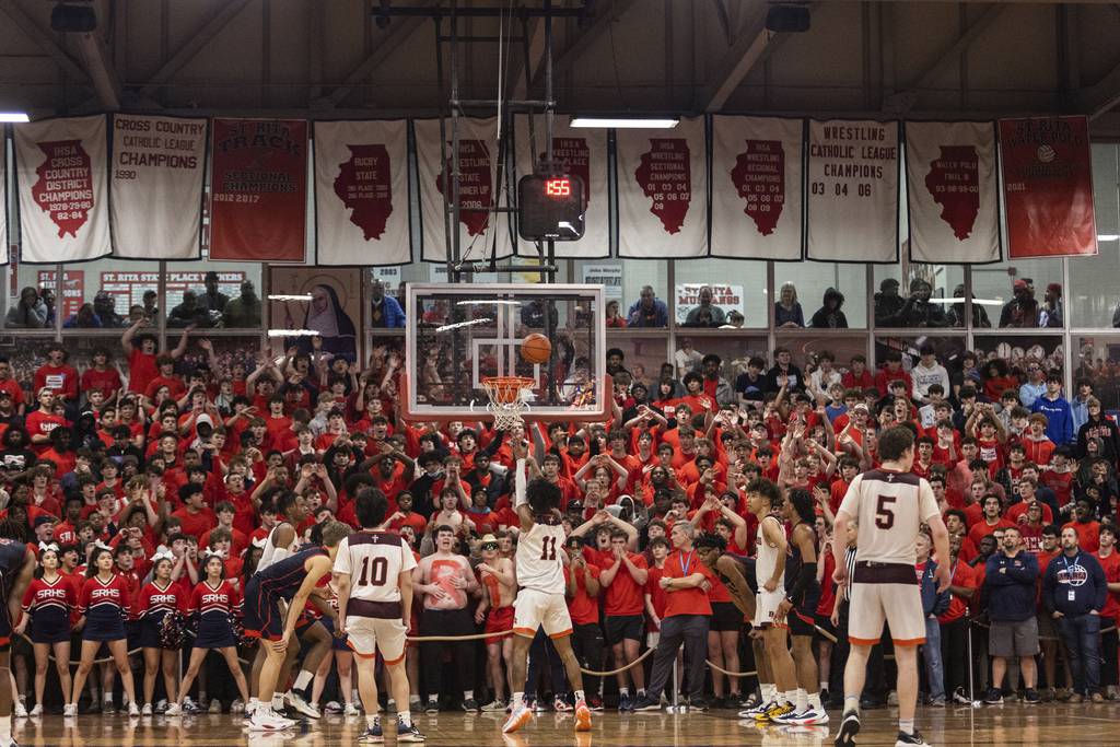 Brother Rice's Ahmad Henderson (11) shoots a free throw against St. Rita during the final minutes of a Class 4A St. Rita Sectional semifinal in Chicago on Wednesday, March 1, 2023.