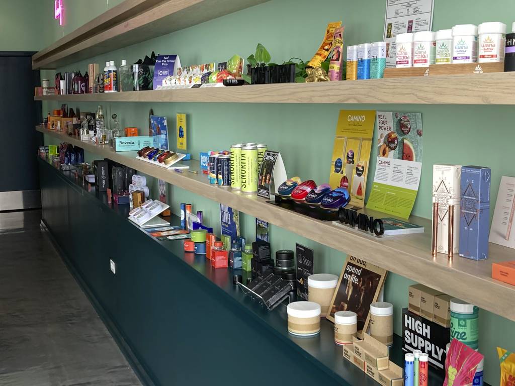 Customers are greeted by this wall displaying scores of products shortly after they enter the Ivy Hall cannabis dispensary in Waukegan.