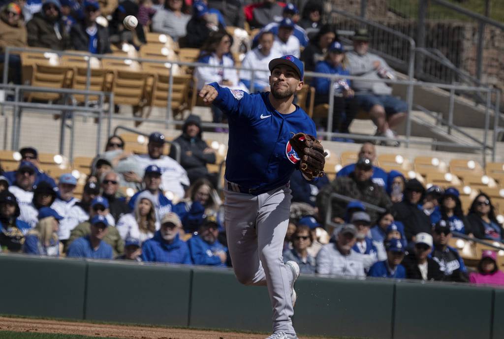 Third baseman Nick Madrigal makes a putout in the first inning of the Cubs’ 9-4 loss to the Dodgers on Feb. 26, 2023, at Camelback Ranch in Glendale, Ariz.