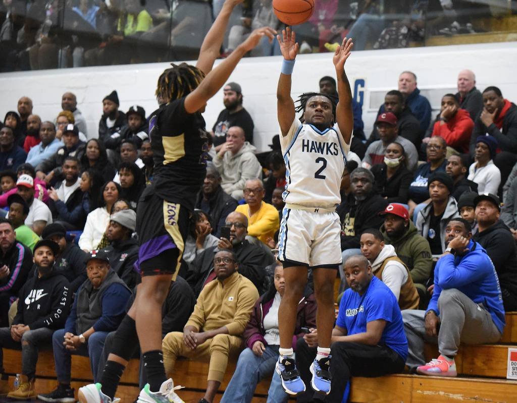 Hillcrest's Bryce Tillery (2) puts up a shot agianst T.F. North during the Class 3A Hillcrest Sectional semifinals in Country Club Hills on Tuesday, Feb. 28, 2023.
