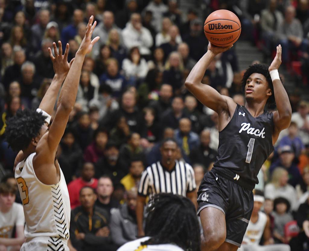 Oswego East's Andrew Wiggins (1) shoots a fadeaway jumper against Joliet West during the Class 4A Bolingbrook Sectional championship game on Friday, March 3, 2023.