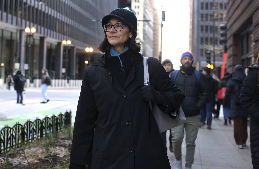 Defendant Anne Pramaggiore walks down Dearborn Street after exiting the U.S. Dirksen Courthouse in downtown Chicago following the first day of the “ComEd Four” bribery conspiracy trial, March 14, 2023. 