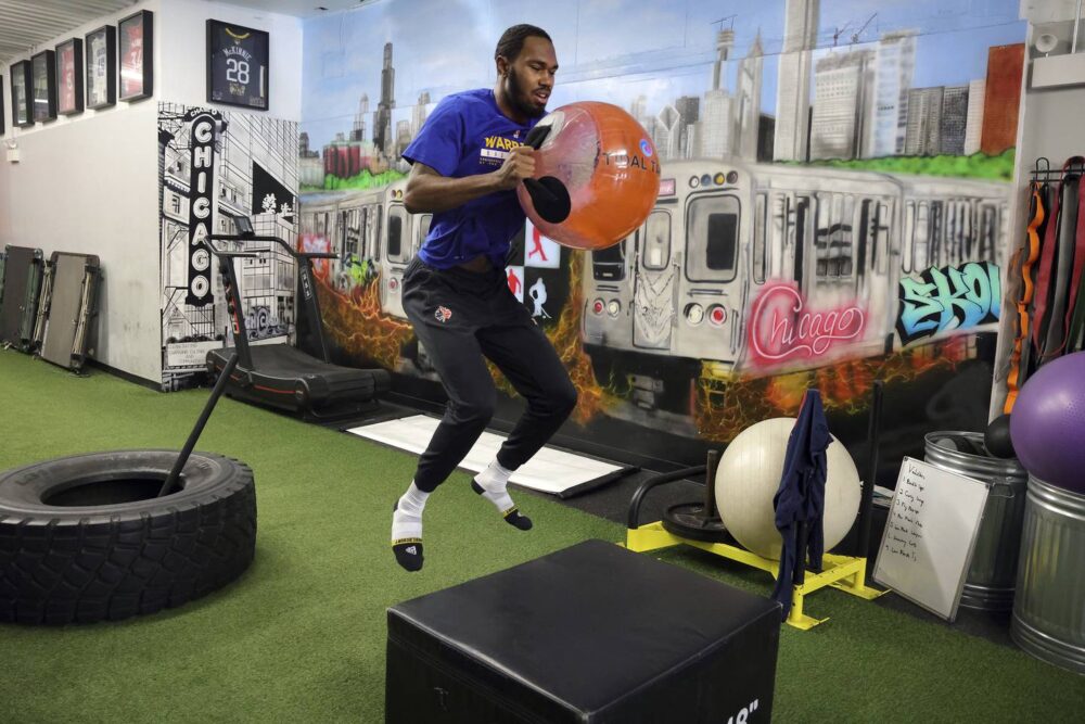 Former Simeon basketball player Jaylon Tate works out at P.R.O. Fitness and Sports Academy in Chicago, Jan. 31, 2023. 