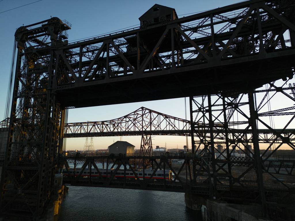 Calumet River Norfolk Southern Railroad bridges over the Calumet River, with the Chicago Skyway Toll Bridge in the background, March 27, 2023.