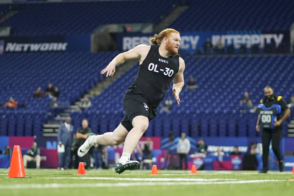 North Dakota State offensive lineman Cody Mauch runs a drill at the NFL combine on March 5, 2023.