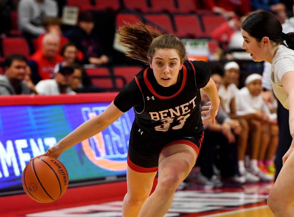 Benet’s Maggie Sularski (33) works her way around O’Fallon’s Josie Christopher during the second overtime of the Class 4A state championship game at Illinois State’s CEFCU Arena in Normal on Saturday, March 4, 2023.
