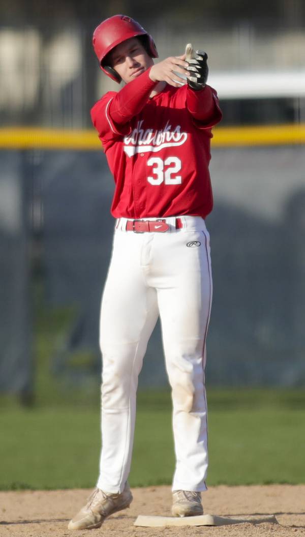 Naperville Central’s Colin Barczi celebrates after hitting an RBI double against Naperville North during a DuPage Valley conference game in Naperville on Tuesday, April 26, 2022. 