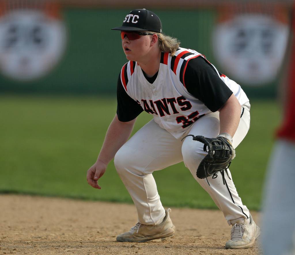 St. Charles East's James Brennan (35) anticipates a pitch against Batavia during a DuKane Conference game in St. Charles on Wednesday, May 11, 2022.