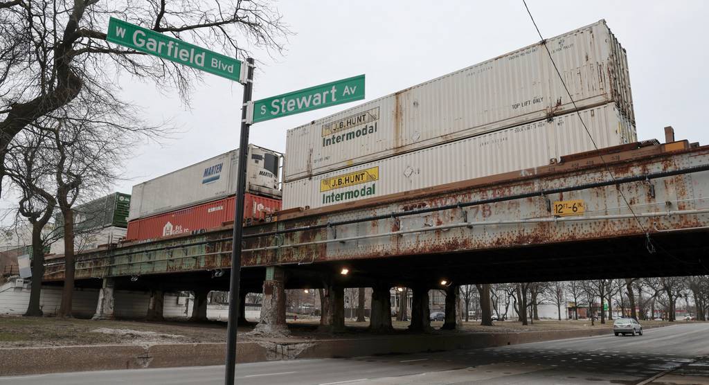 A freight train is parked above Stewart Avenue near Garfield Boulevard  in Chicago, near the Norfolk Southern railroad’s Intermodal facility, March 16, 2023.