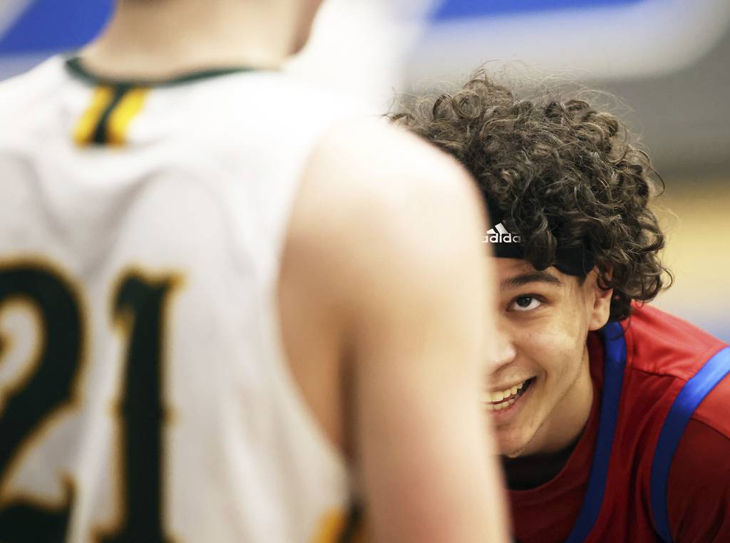 Marmion's Jabe Haith (2) keeps an eye on Crystal Lake South's James Carlson (24) during a Class 3A Burlington Central Sectional semifinal game on Tuesday, Feb. 28, 2023.