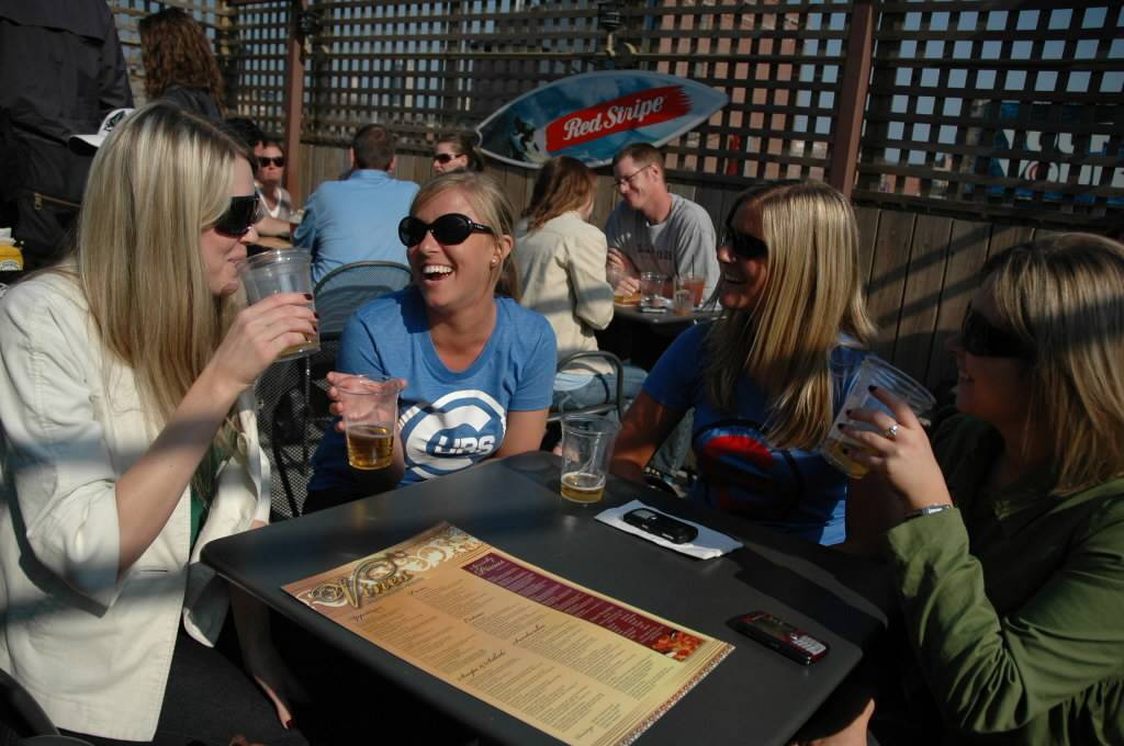 Laura Lange, from left, Maggie Spink, Ramsey Schmitt and Katie Canova hang out at Vines on Clark in 2008.  