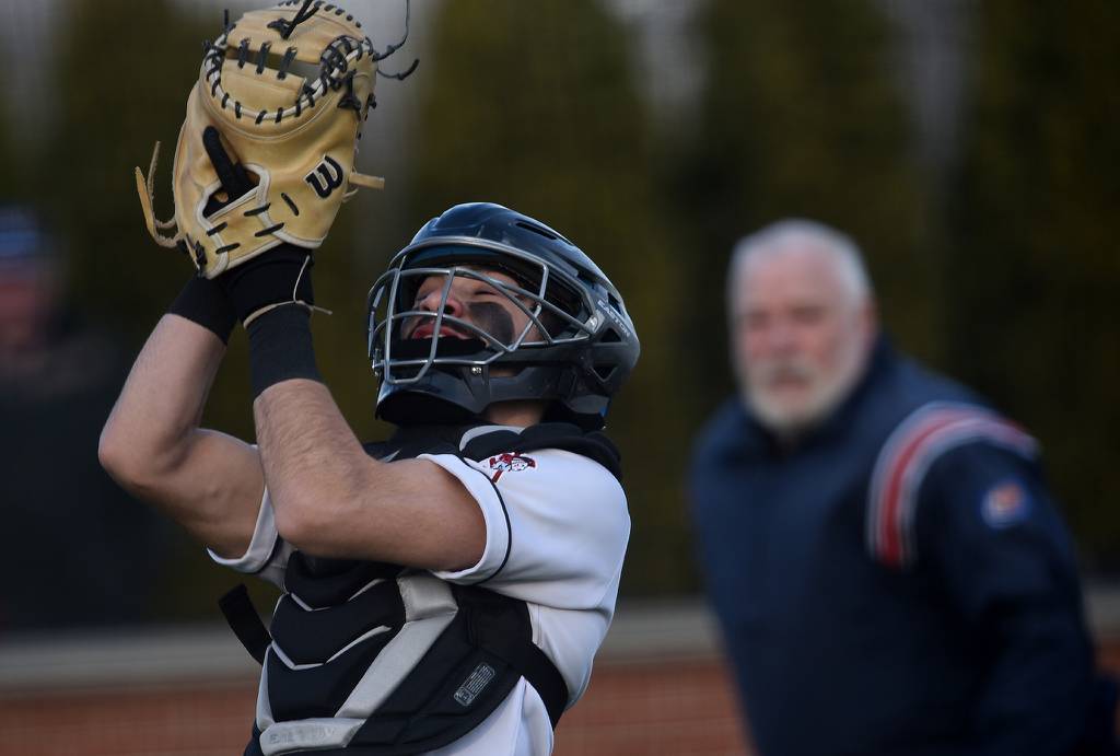 Bremen's catcher Armando Aguilar (1) catches a foul ball against Chicago Christian during a nonconference game in Palos Heights on Monday, March 20, 2023.