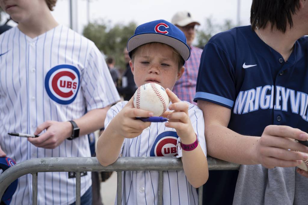 Grady Murphy collects autographs outside Sloan Field in Mesa, Arizona on Feb. 25, 2023. 