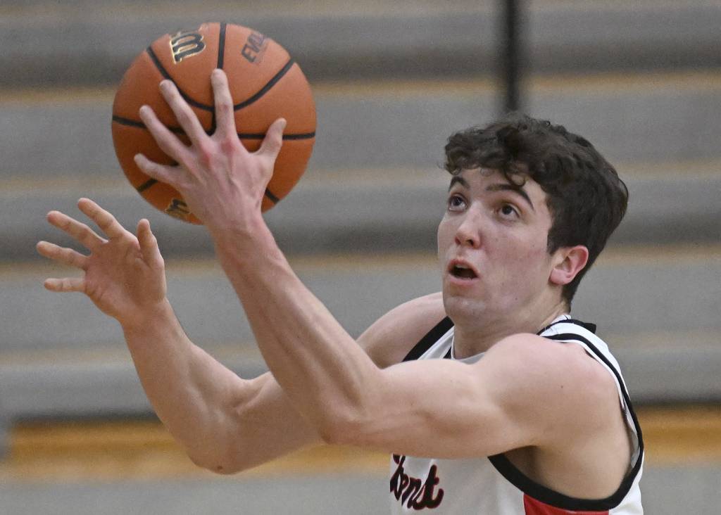 Benet’s Sam Driscoll puts up a shot during a Class 4A Bartlett Sectional semifinal against Lake Park on Tuesday, Feb. 28, 2023. 