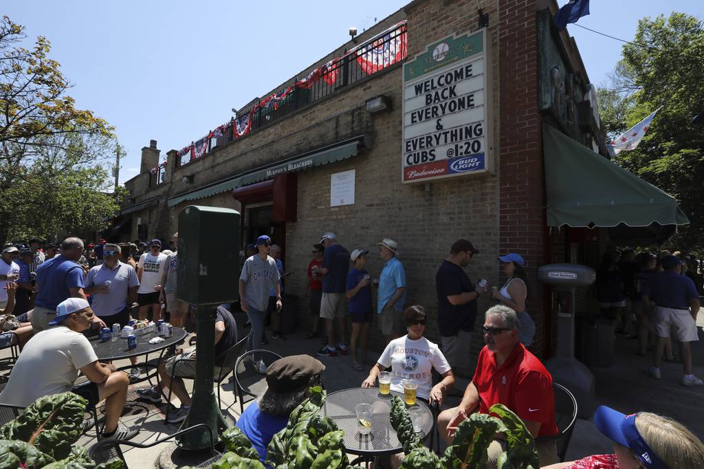 A sign at Murphy's Bleachers welcomes back Cubs fans outside of Wrigley Field in Chicago on June 11, 2021. 