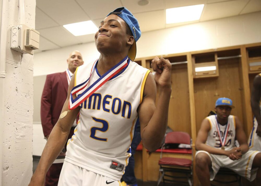 Simeon's Saieed Ivey celebrates in the locker room following the team's  state championship win over Stevenson at Peoria's Carver Arena on March 16, 2013.  