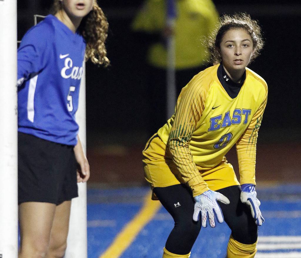 Lincoln-Way East goalkeeper Mattea Arroyo (0) waits a corner kick by Andrew during a SouthWest Suburban Conference crossover in Frankfort on Tuesday, March 28, 2023.