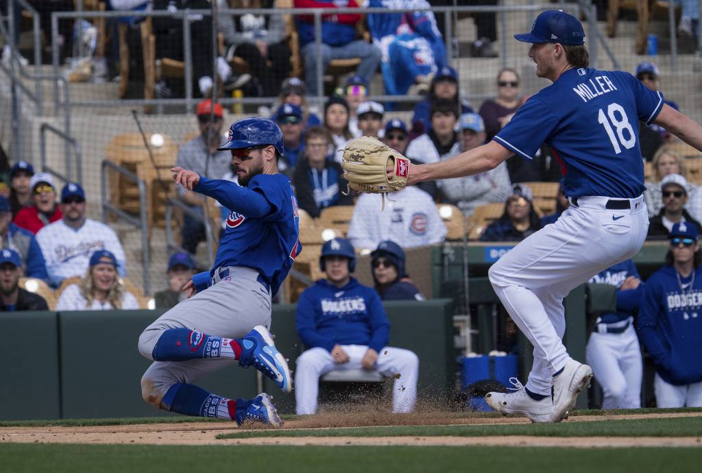 Mike Tauchman scores from third on a wild pitch in the second inning of the Cubs’ 9-4 loss to the Dodgers on Feb. 26, 2023, at Camelback Ranch in Glendale, Ariz.