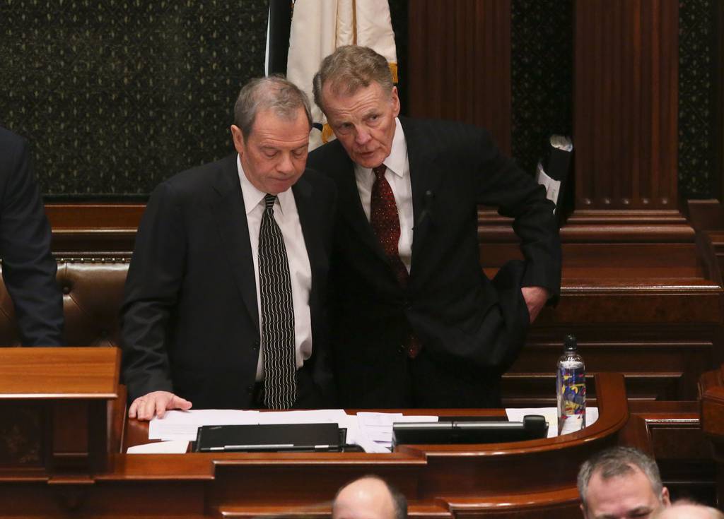House Speaker Michael Madigan, right, and Senate President John Cullerton speak before Republican Gov. Bruce Rauner gives his State of the State speech at the Illinois State Capitol on Jan. 31, 2018, in Springfield.   