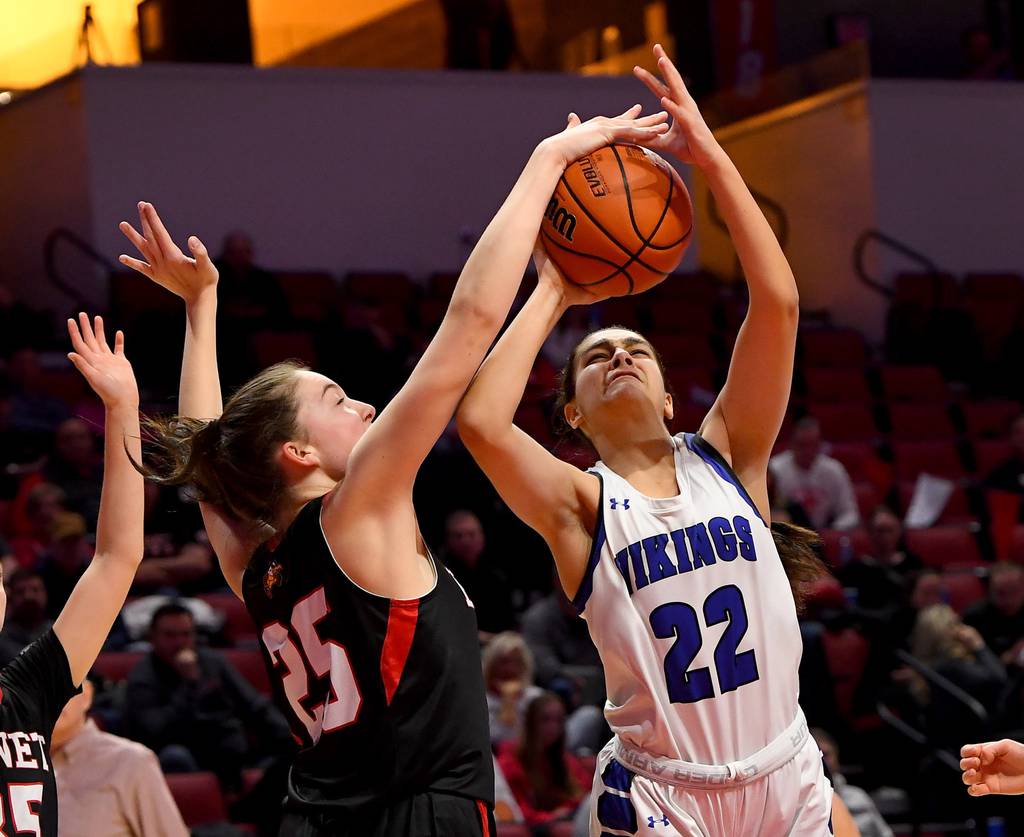 Benet’s Samantha Trimberger (25) blocks a shot by Geneva’s Leah Palmer (22) during a Class 4A state semifinal at Illinois State’s CEFCU Arena in Normal on Friday, March 3, 2023. 