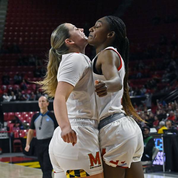 Maryland's Diamond Miller, right, chest bumps teammate Faith Masonius during a victory over Arizona in the second round of the NCAA Tournament in College Park. The Terps have not advanced past the Sweet 16 since the 2014-15 season.