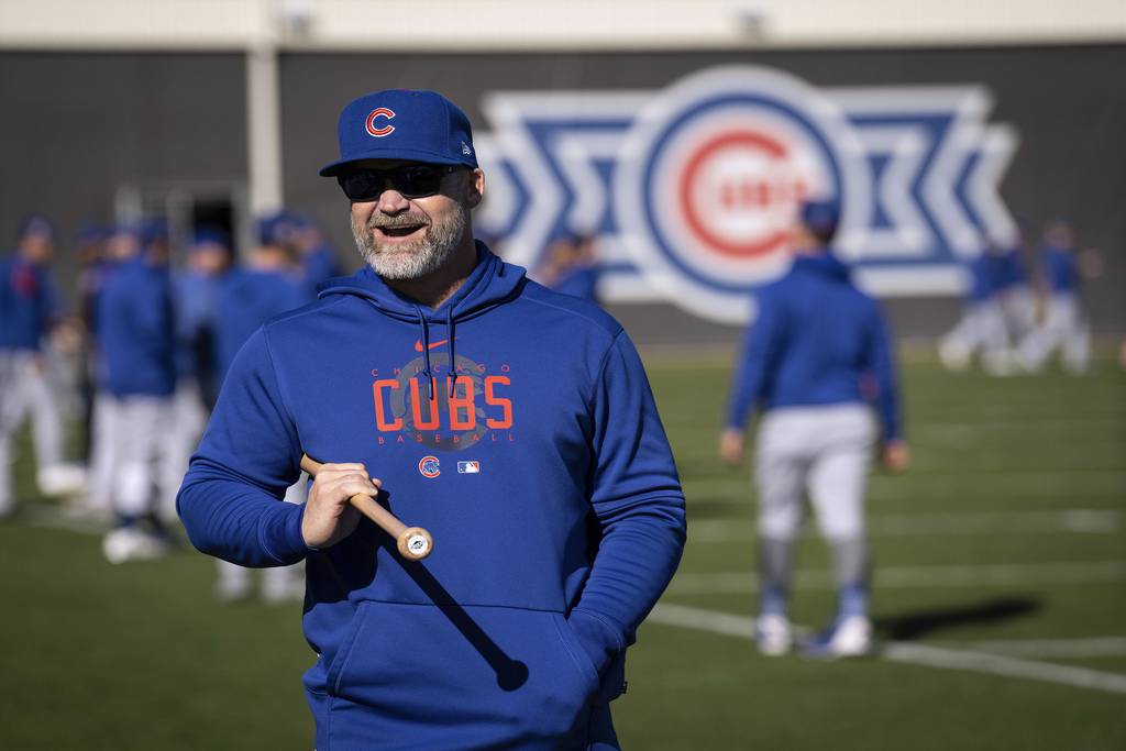 Cubs manager David Ross stops to chat with the media at Sloan Park on Feb. 28, 2023.